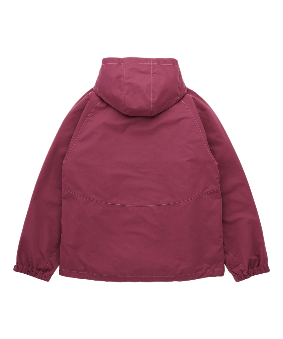 Gramicci burgundy pants side angle showing relaxed fit and movement