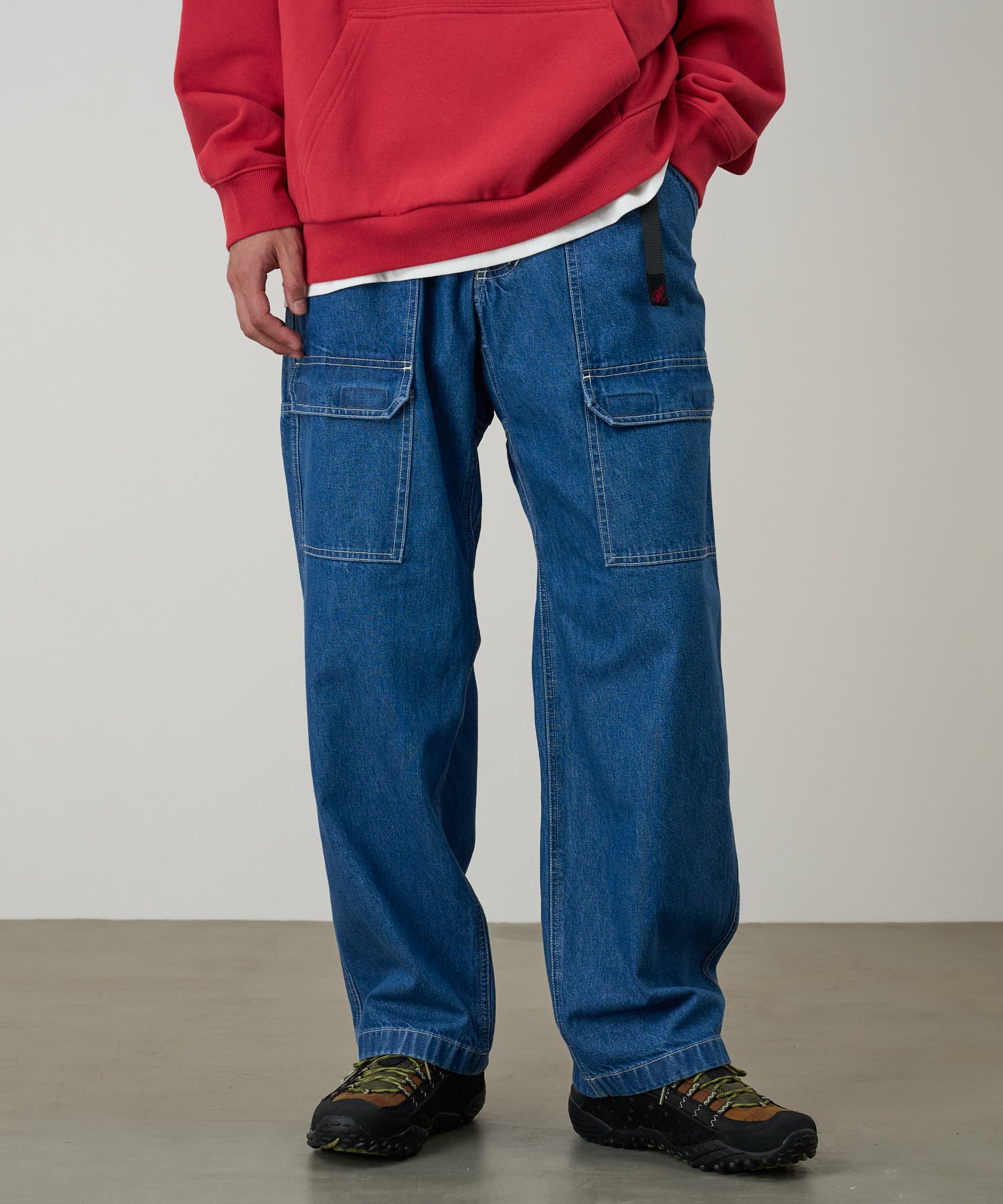 Gramicci denim EQT light wash pants on body fit showing relaxed comfort and movement