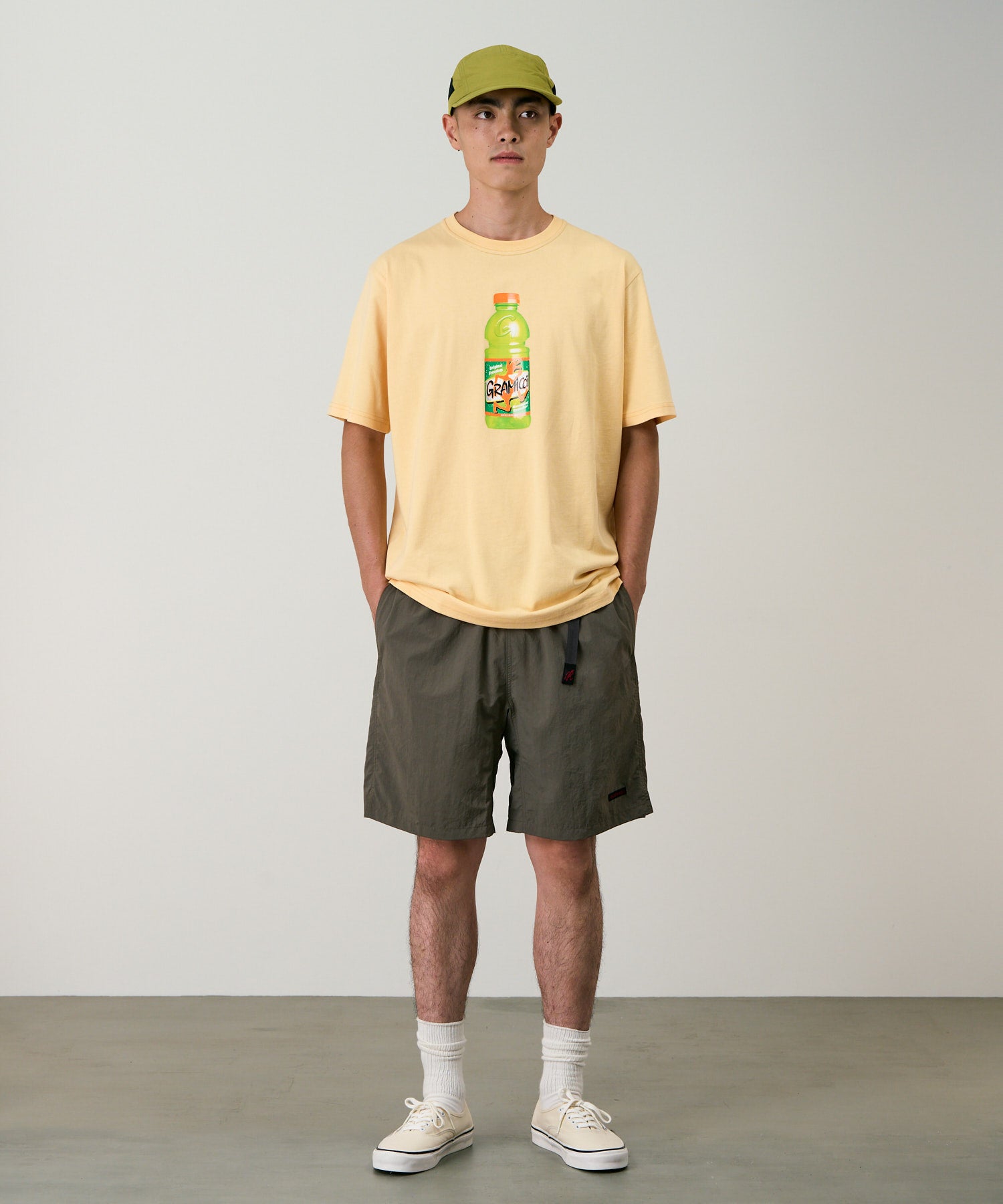 Front view of a model wearing Gramicci Nylon Packable G-Short Granite with lightweight recycled nylon and an adjustable belt for everyday wear.