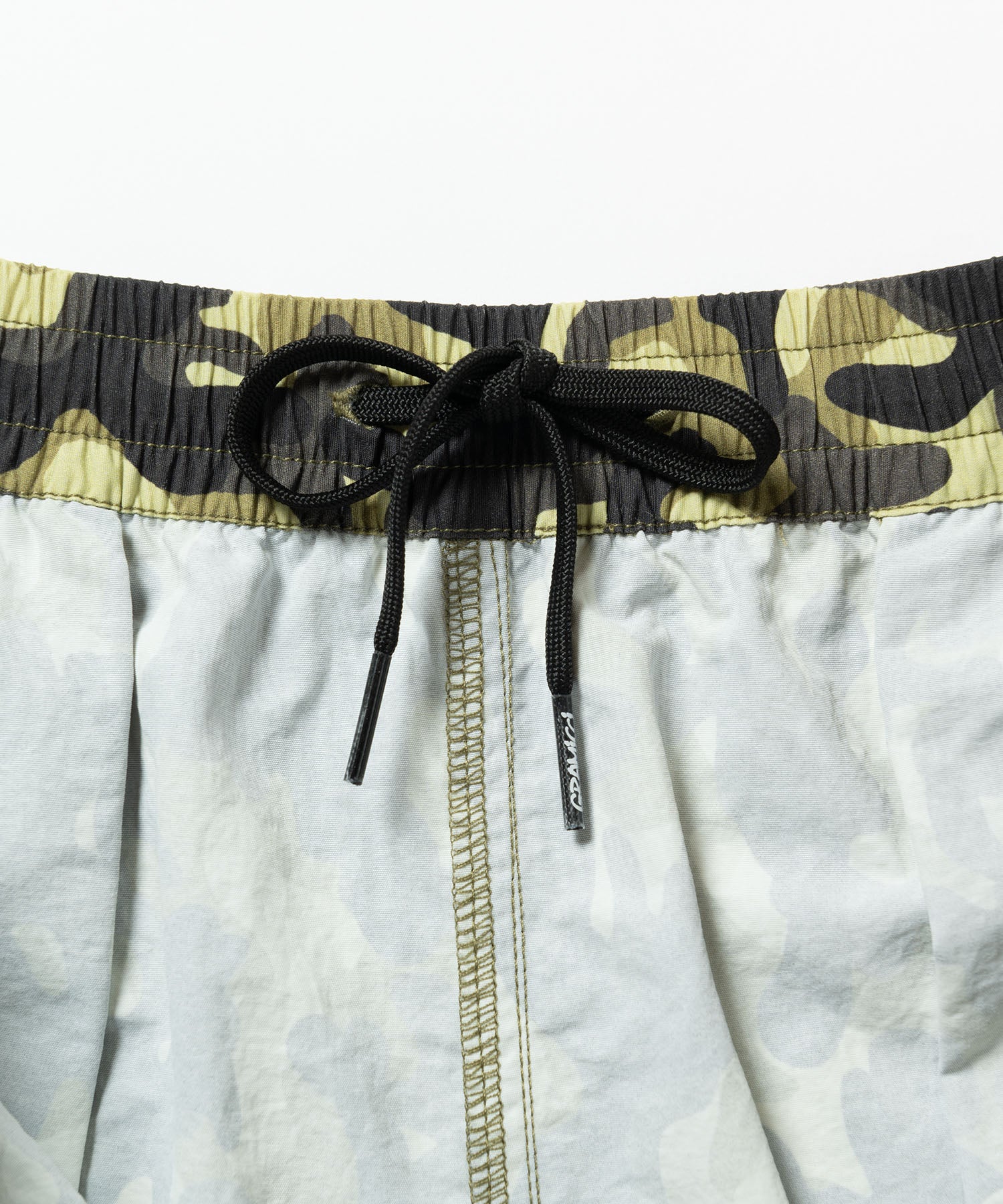 Gramicci Nylon Reef Short Olive Camo detail shot – quick-dry water-resistant nylon fabric texture with durable outdoor finish