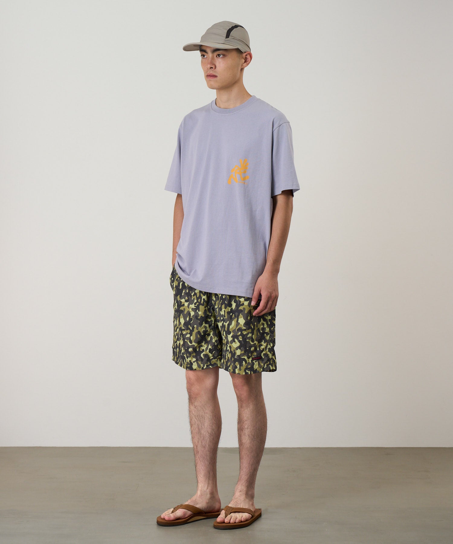 Gramicci Nylon Reef Short Olive Camo on model front view – quick-dry water-resistant shorts with elastic waist for beach and outdoor wear