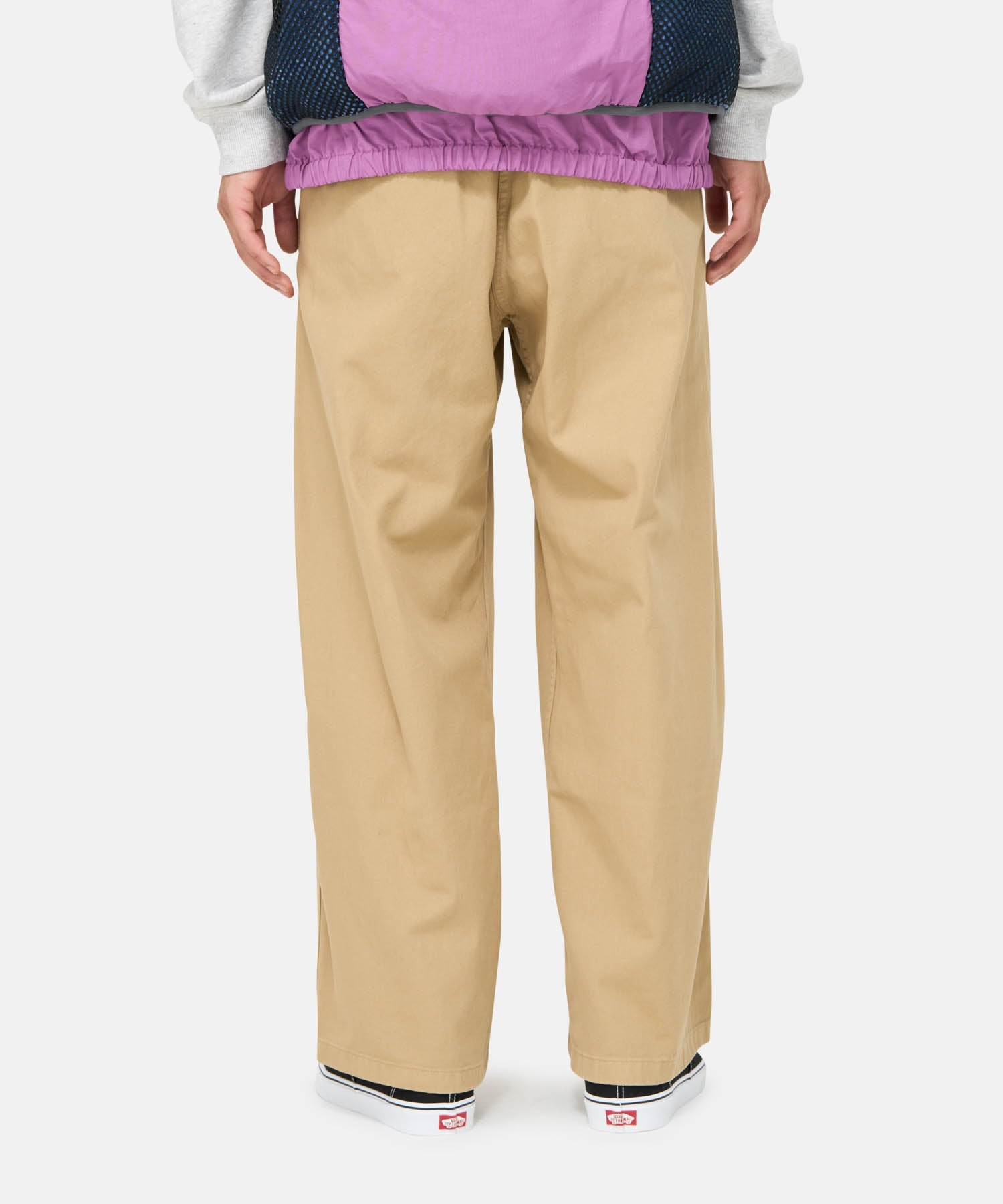 Full-body view of model wearing Gramicci Wide Pant Dune Pigment with a relaxed wide-leg silhouette for everyday comfort, travel and outdoor style.