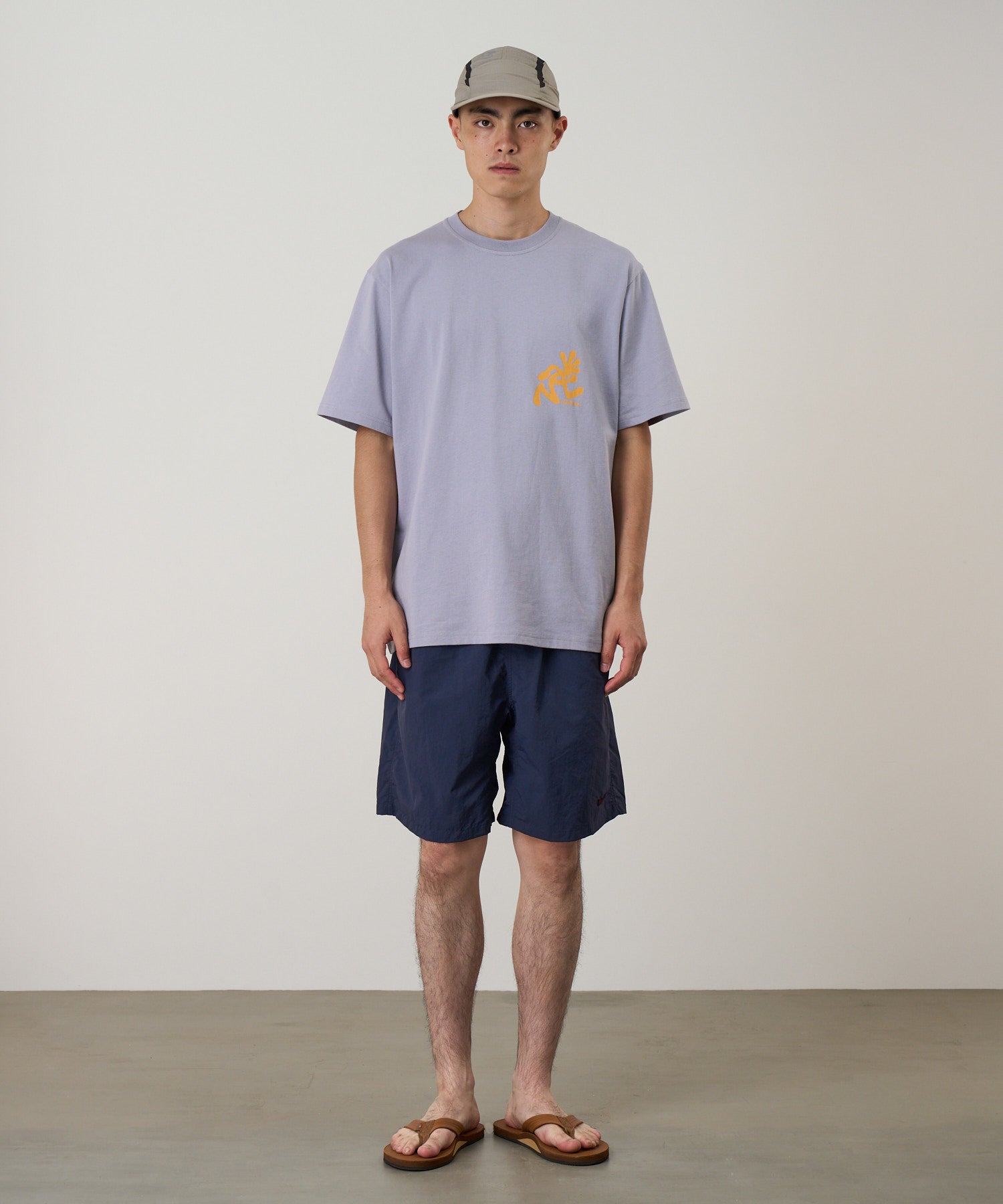 Model wearing Gramicci Nylon Reef Short British Navy quick-dry swim shorts lifestyle fit