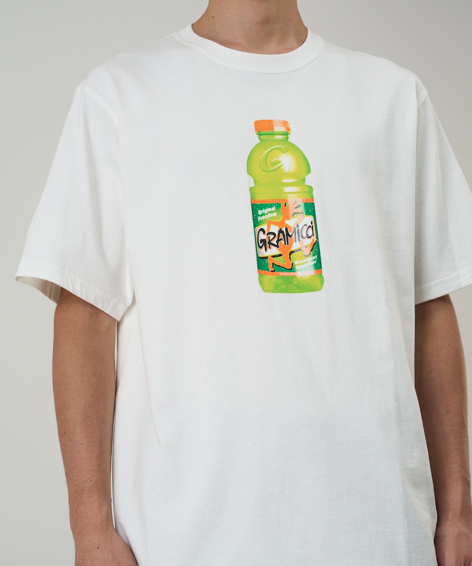 Gramicci Quencher Tee White – model wearing eco cotton t-shirt, relaxed fit streetwear style with breathable dry-touch fabric for everyday comfort Gramicci
