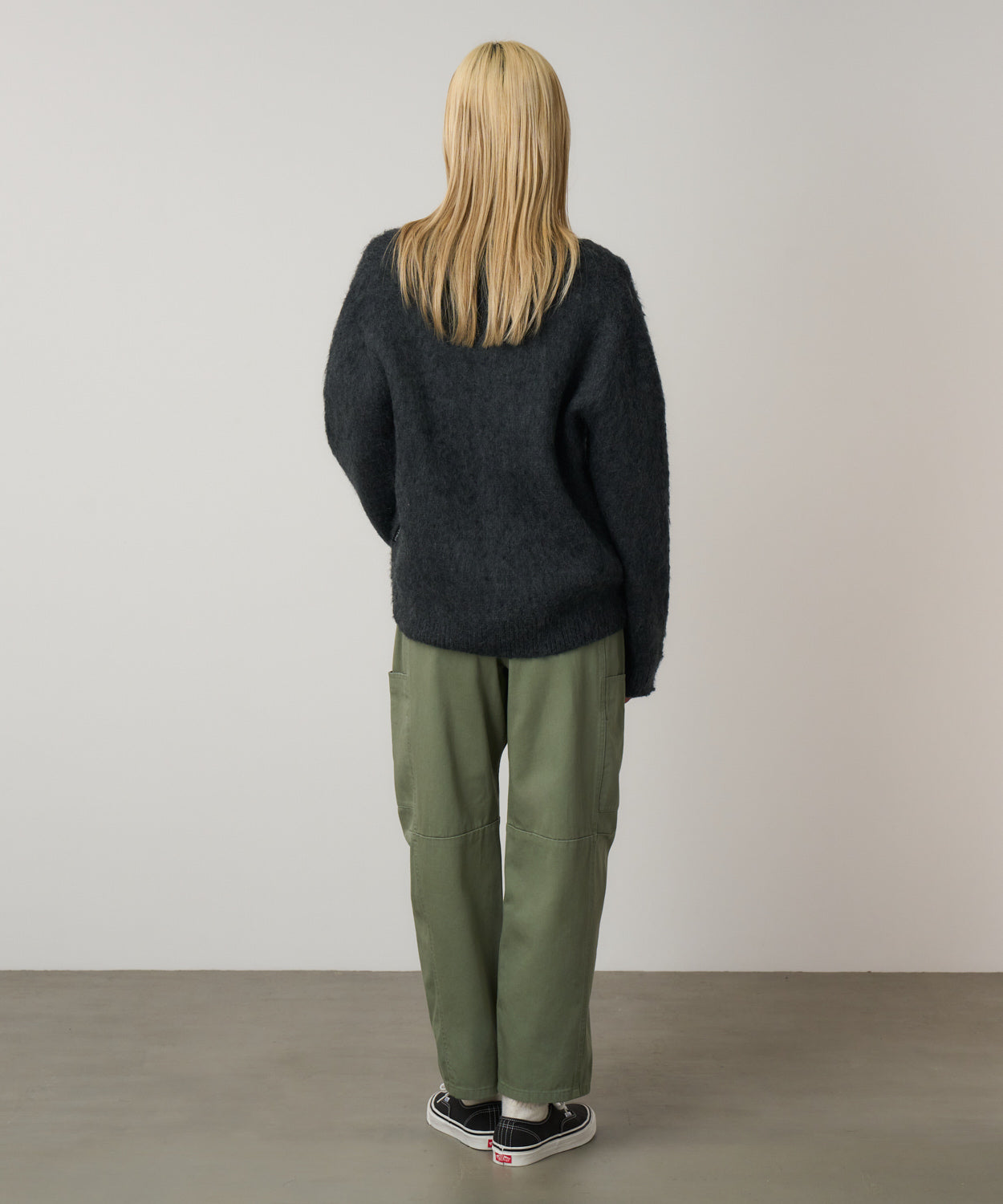 Back view of model wearing Women's Gramicci Voyager Pant Sage in 100% eco cotton washed twill