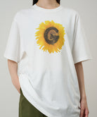 Woman wearing Gramicci G-Flower Tee White eco cotton graphic T-shirt