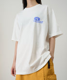 Model wearing Gramicci ’82 Tee White eco cotton graphic T-shirt