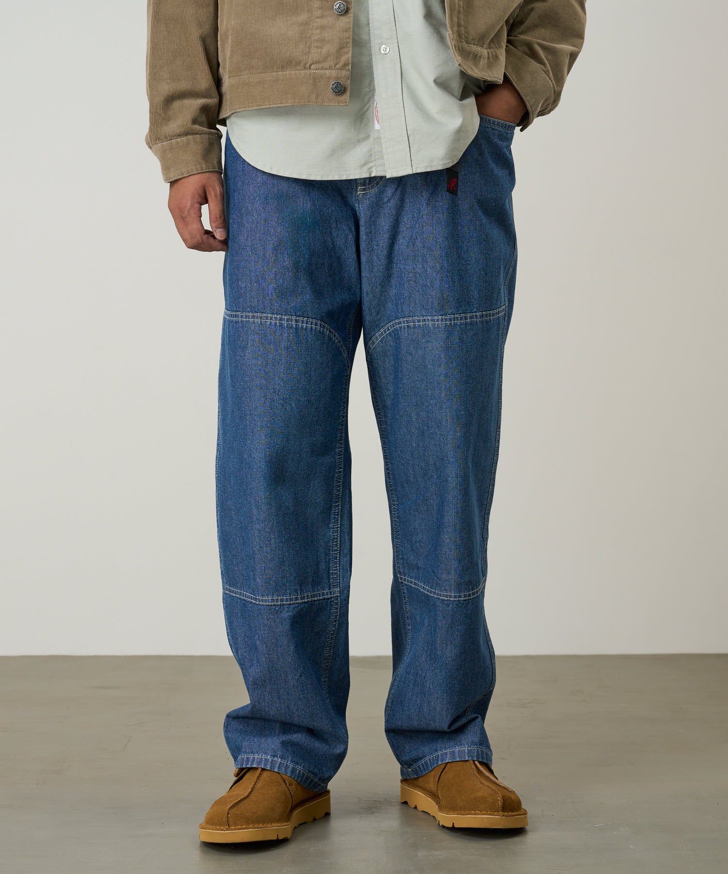 Gramicci workwear pants blue on body fit showing everyday comfort and movement
