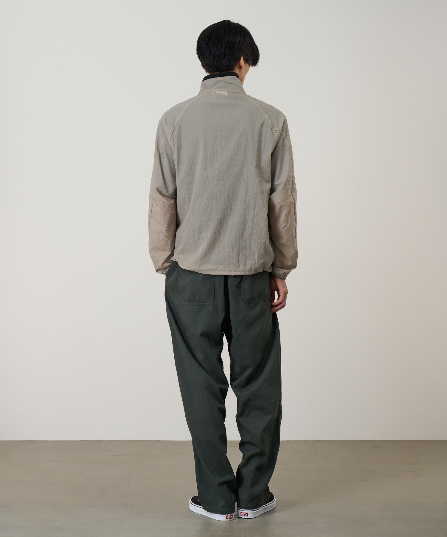 Gramicci concrete jacket worn on model showing back or alternate angle relaxed fit