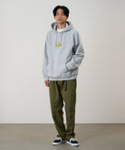 Gramicci hoodie heather grey on body front fit showing relaxed everyday comfort