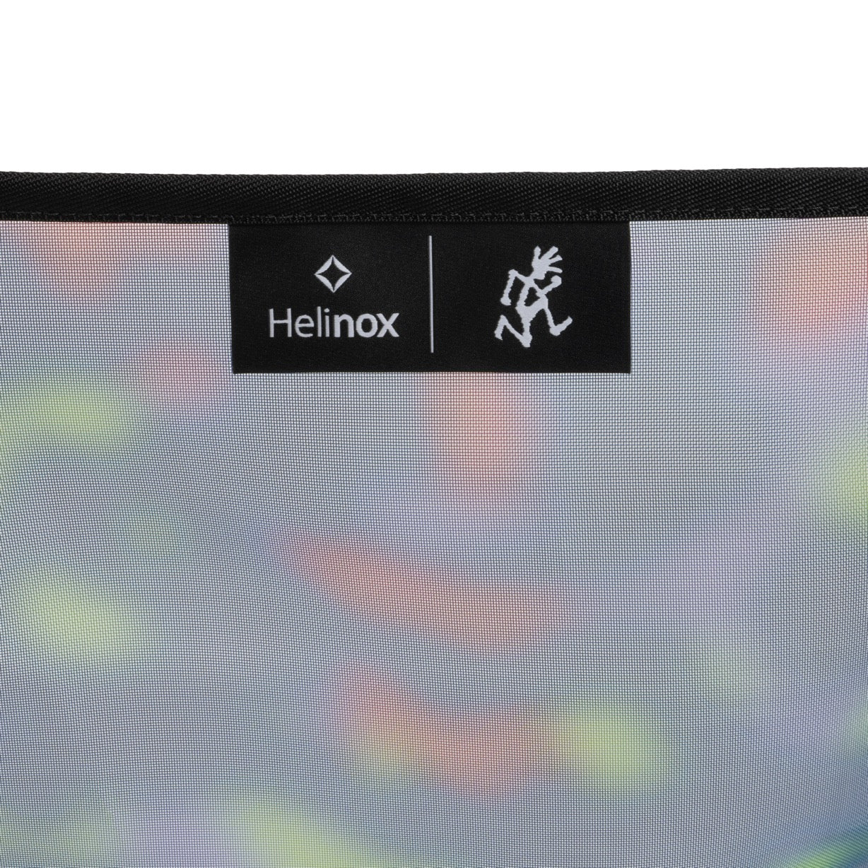 Wide lifestyle view of Helinox x Gramicci camping chair in real outdoor use