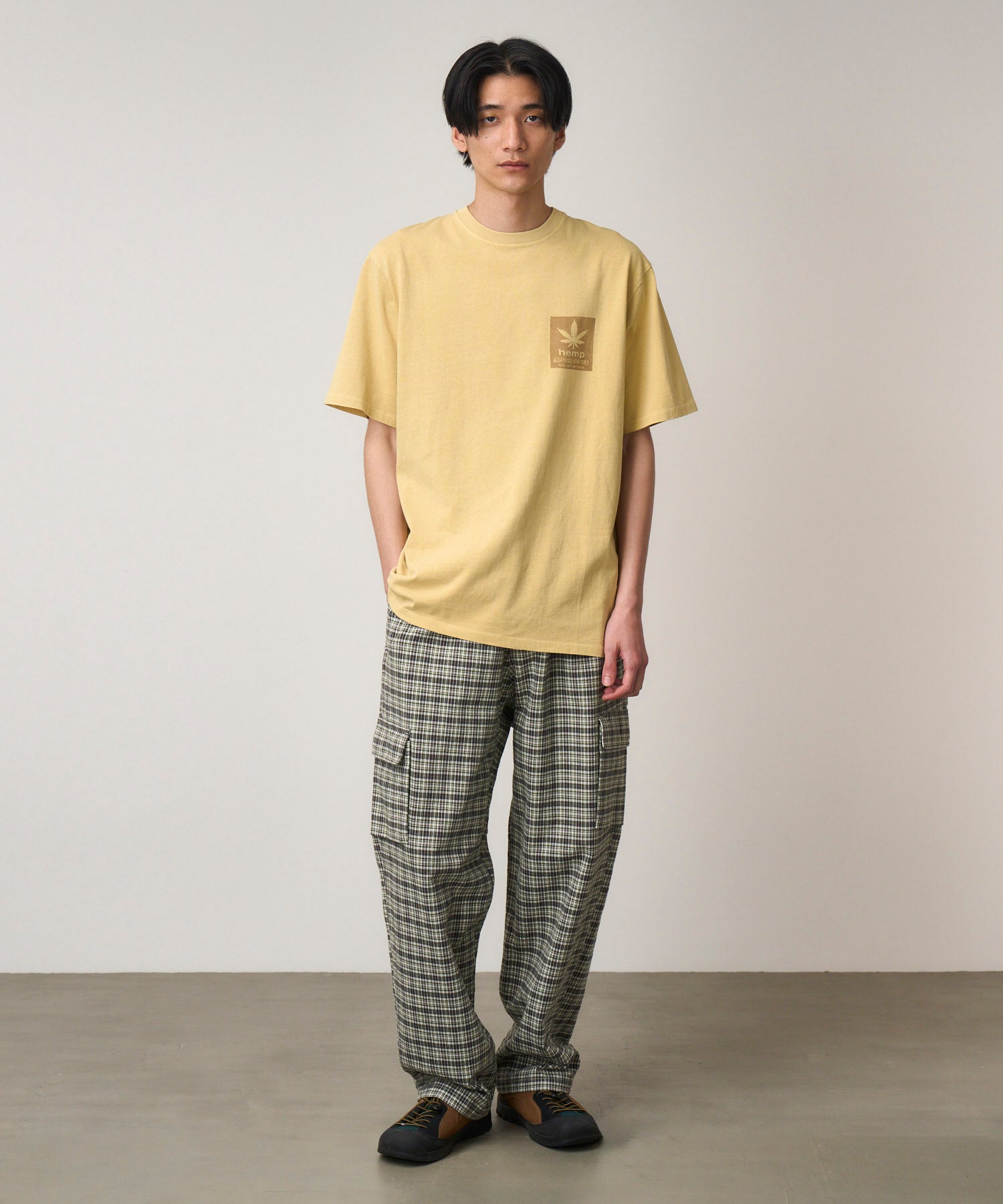 Model Wearing Gramicci Hemp Tee Mustard Pigment