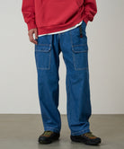 Gramicci denim EQT light wash pants on body fit showing relaxed comfort and movement