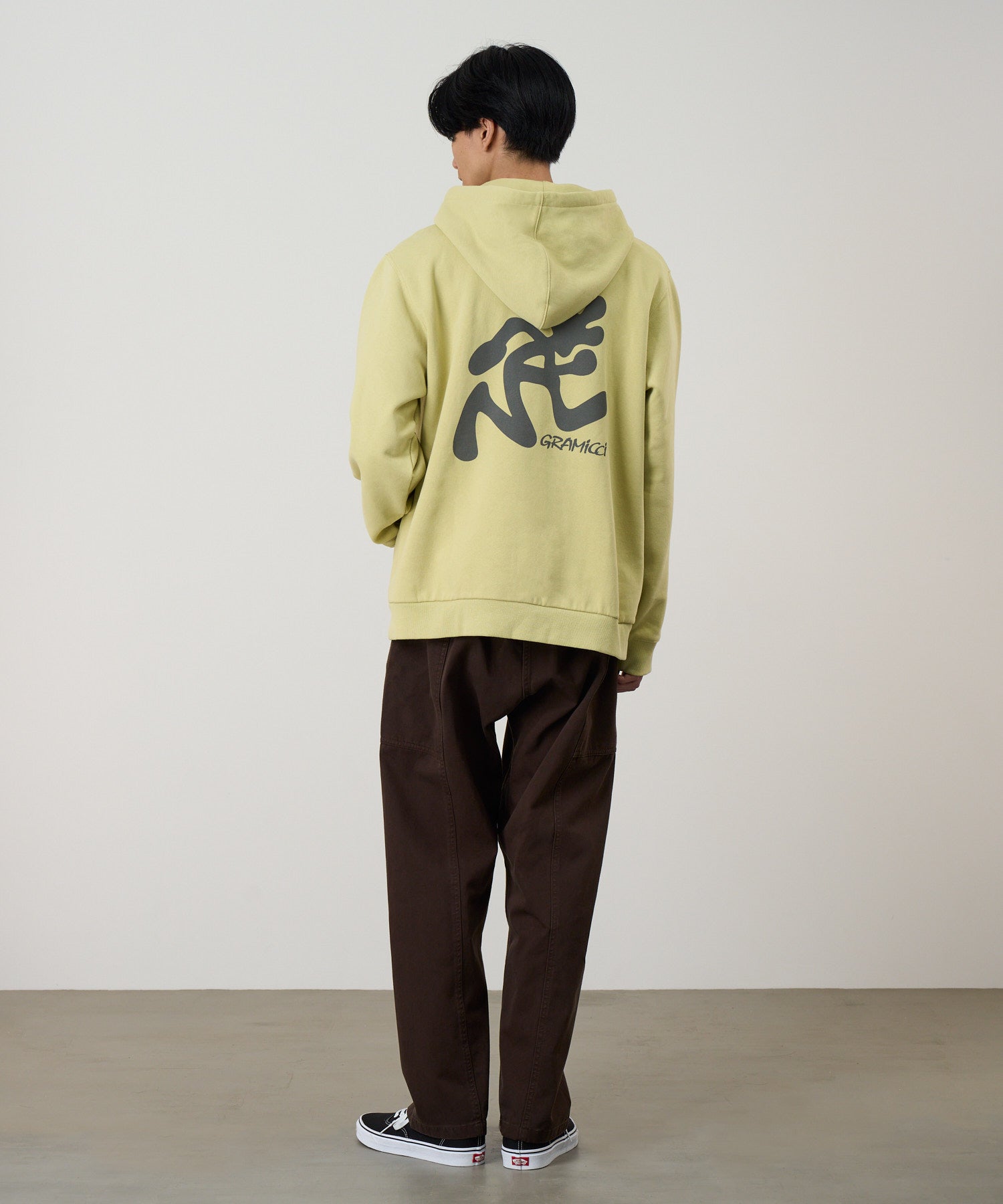 Gramicci Running Man hoodie in lime green – relaxed fit sweatshirt side view detail for outdoor and casual wear