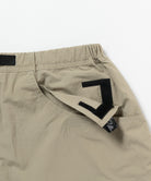 Close-up detail of Gramicci Nylon Cliff Short Milk Tea showing durable recycled nylon fabric and premium construction for everyday wear.