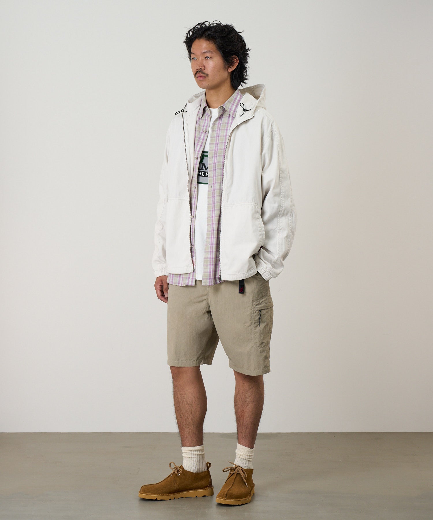 Side view of Gramicci Nylon Cliff Short Milk Tea featuring lightweight recycled nylon, cargo pockets and a relaxed fit for everyday wear.