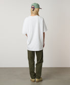 Granola Tee Heather Ash eco cotton graphic t-shirt back view on model relaxed fit casual wear