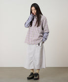 Model wearing Gramicci Nylon Utility Skirt Ecru water-resistant recycled nylon skirt lifestyle fit