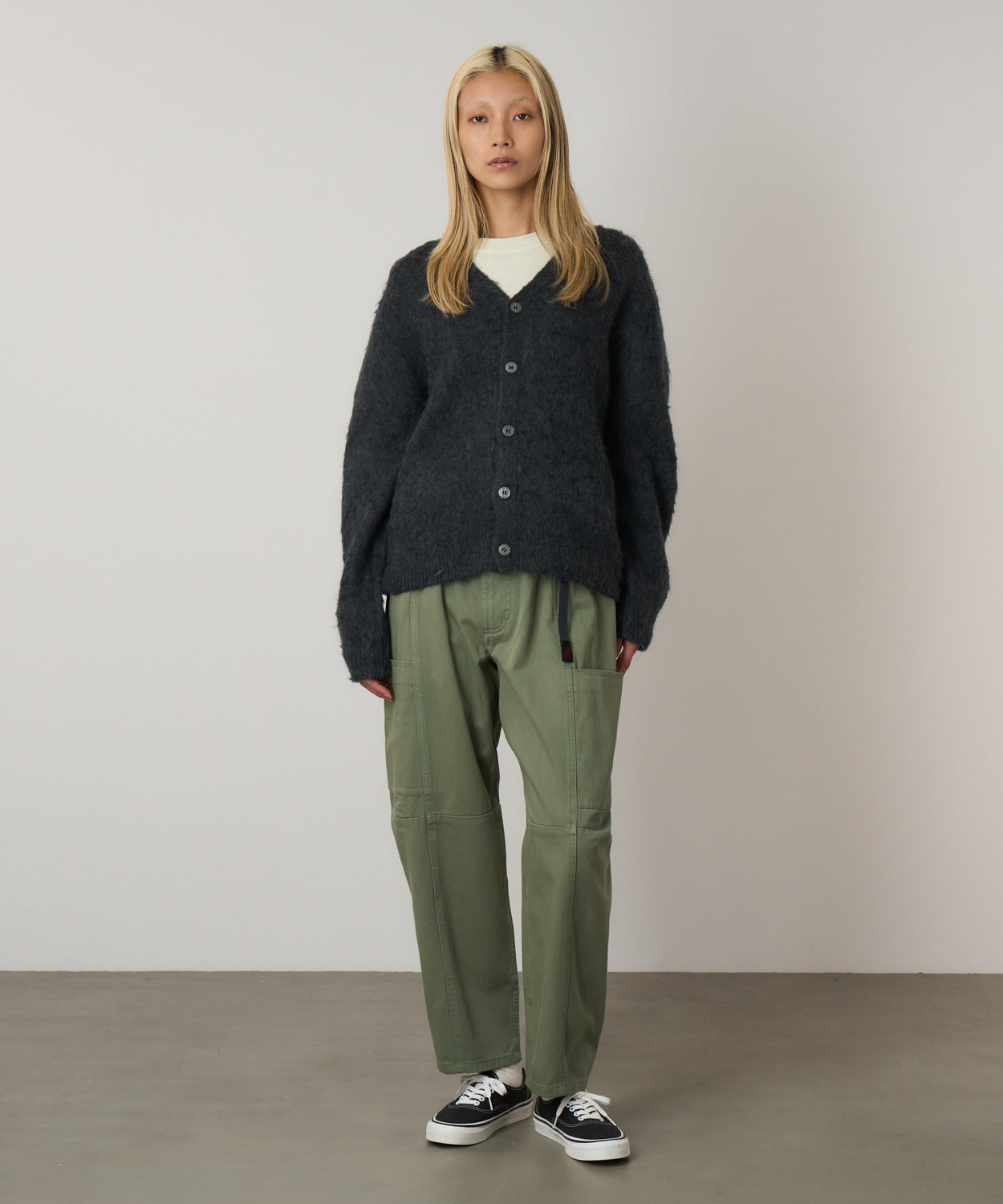 Model wearing Women's Gramicci Voyager Pant Sage in 100% eco cotton washed twill with relaxed tapered fit